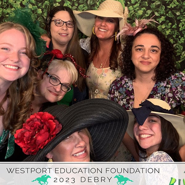 Careers-03 Group of women wearing decorative derby hats