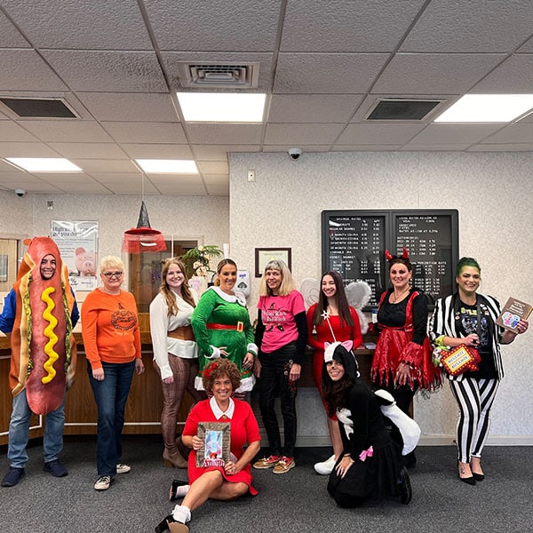 Careers-05 Staff group dressed in Halloween costumes